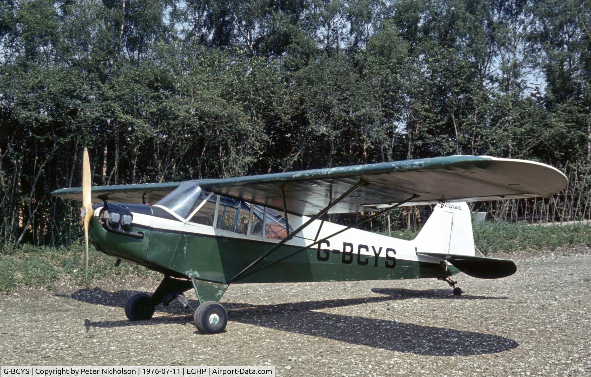 G-BCYS, 1944 Piper J3C-65 Cub Cub C/N 44-86094, Another of the Piper Cubs present at the 1976 Popham Fly-In.