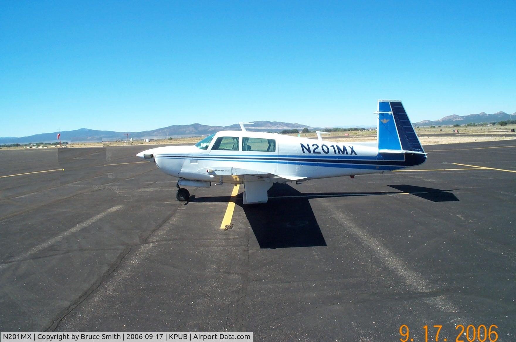 N201MX, 1977 Mooney M20J 201 C/N 24-0266, On The Ramp Pueblo Co.