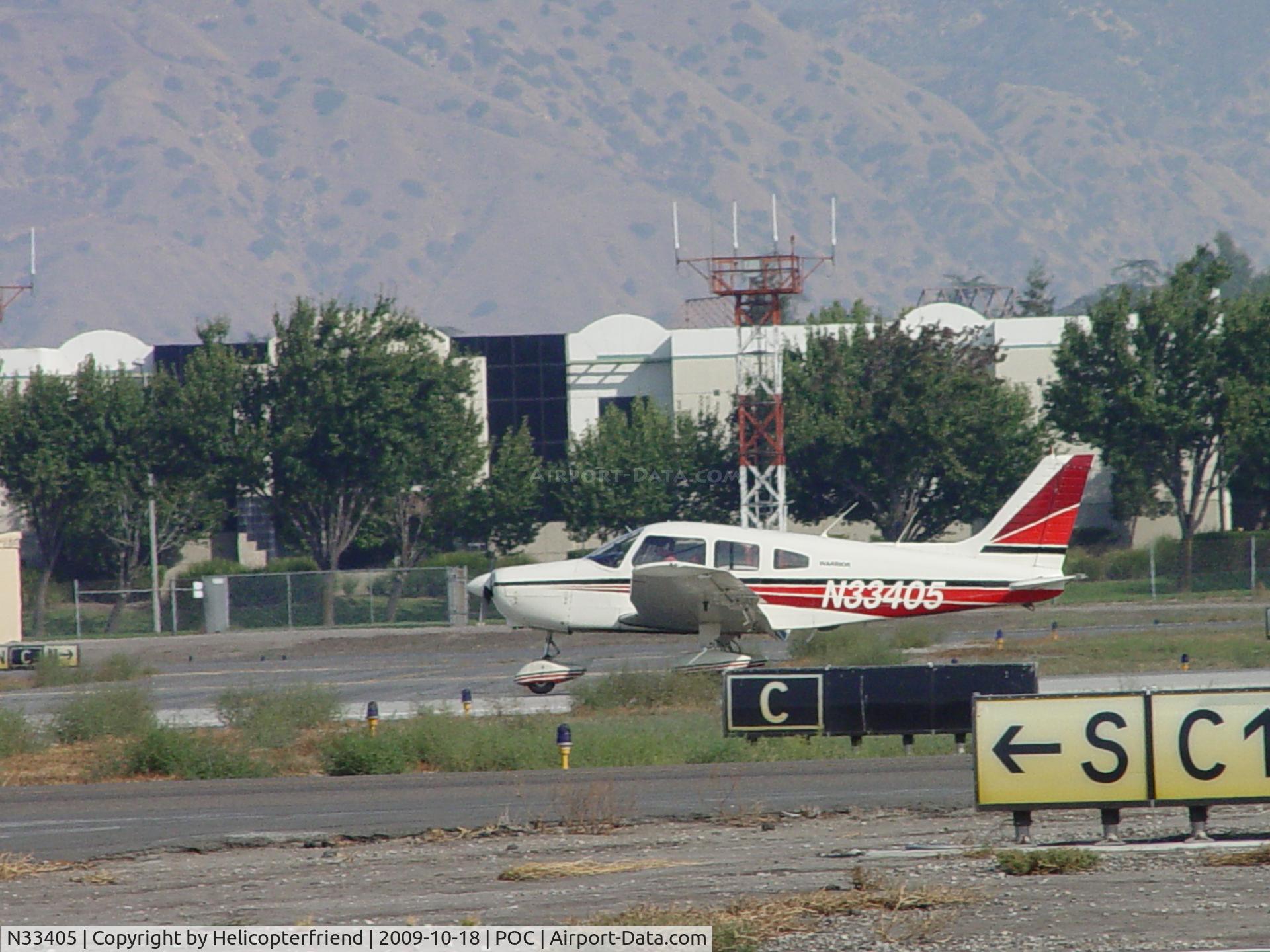 N33405, 1975 Piper PA-28-151 C/N 28-7515335, Rolling out on 26L after touching down