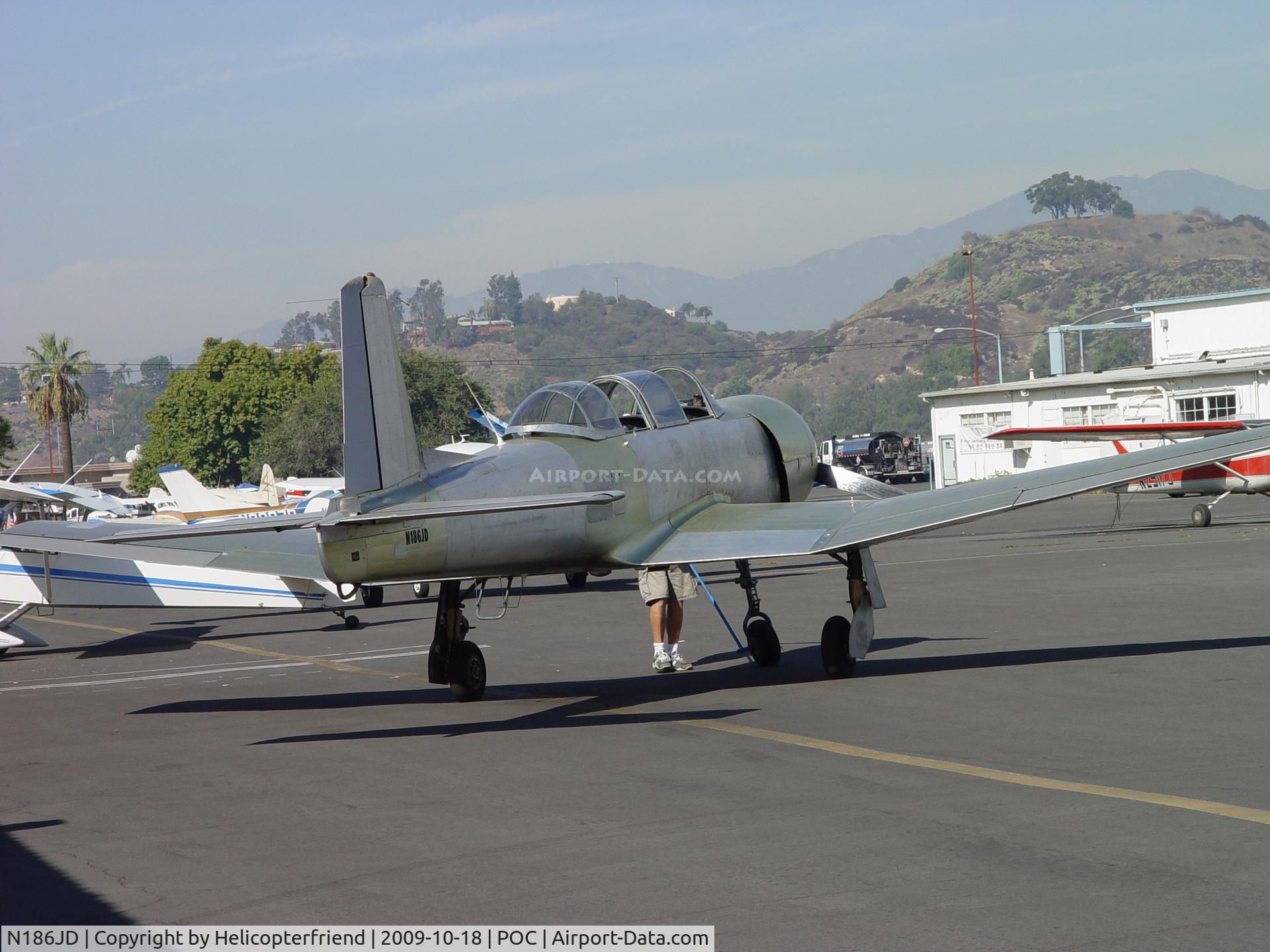 N186JD, 1973 Nanchang CJ-6A C/N 2851250, Being pulled out of the hanger