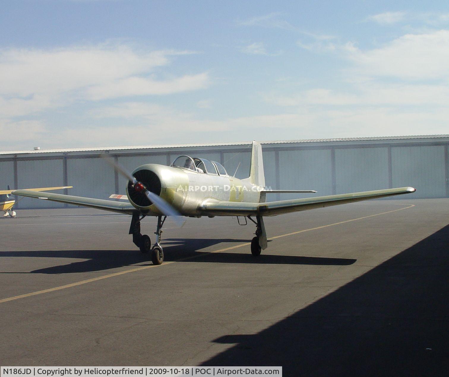 N186JD, 1973 Nanchang CJ-6A C/N 2851250, Notice smoke to the rear, just started up