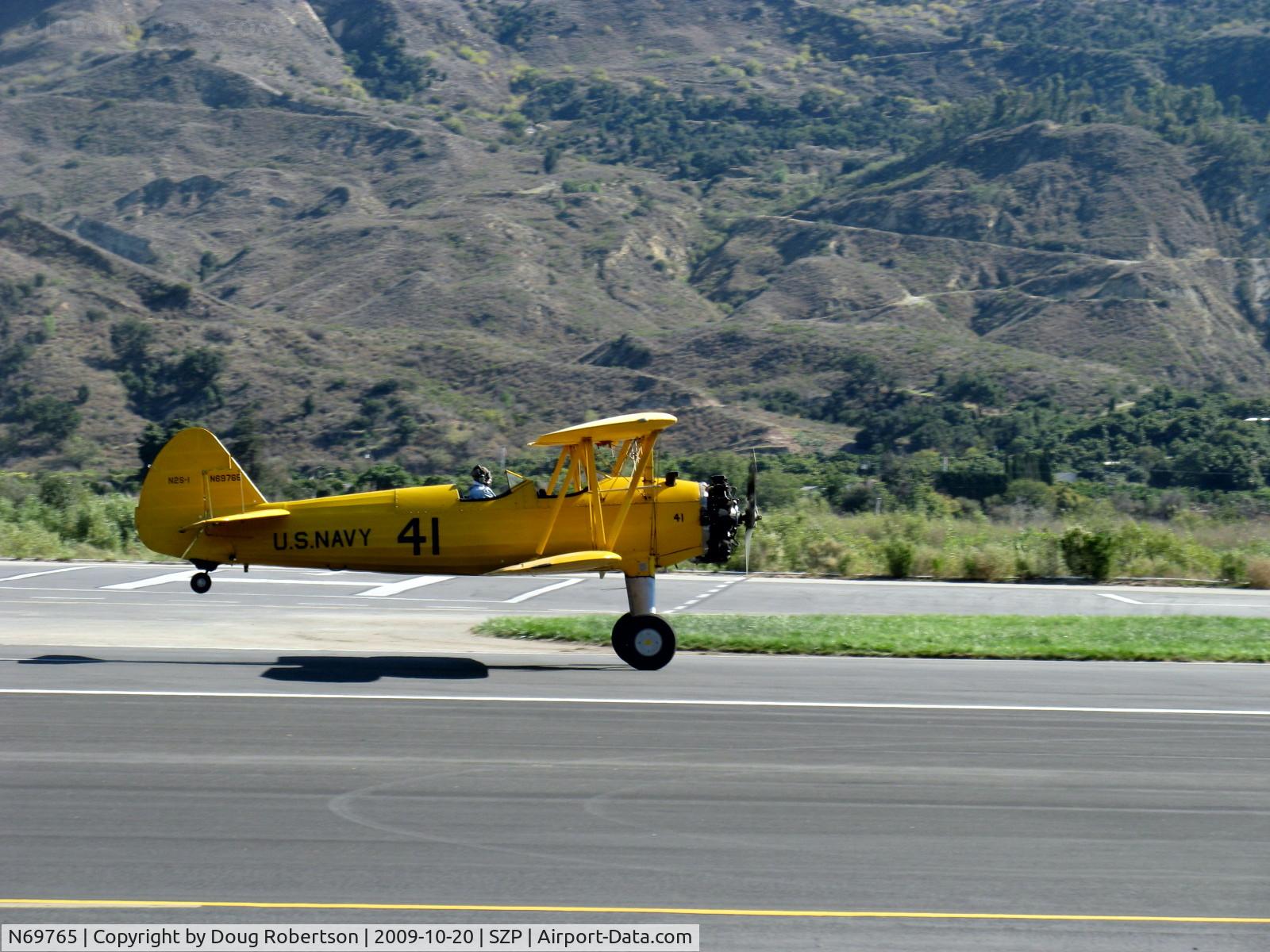 N69765, 1941 Boeing A75N1 (PT17) C/N 75-1044, 1941 Boeing Stearman A75N1 as Navy N2-S1, Continental W-670 220 Hp, landing roll Rwy 22