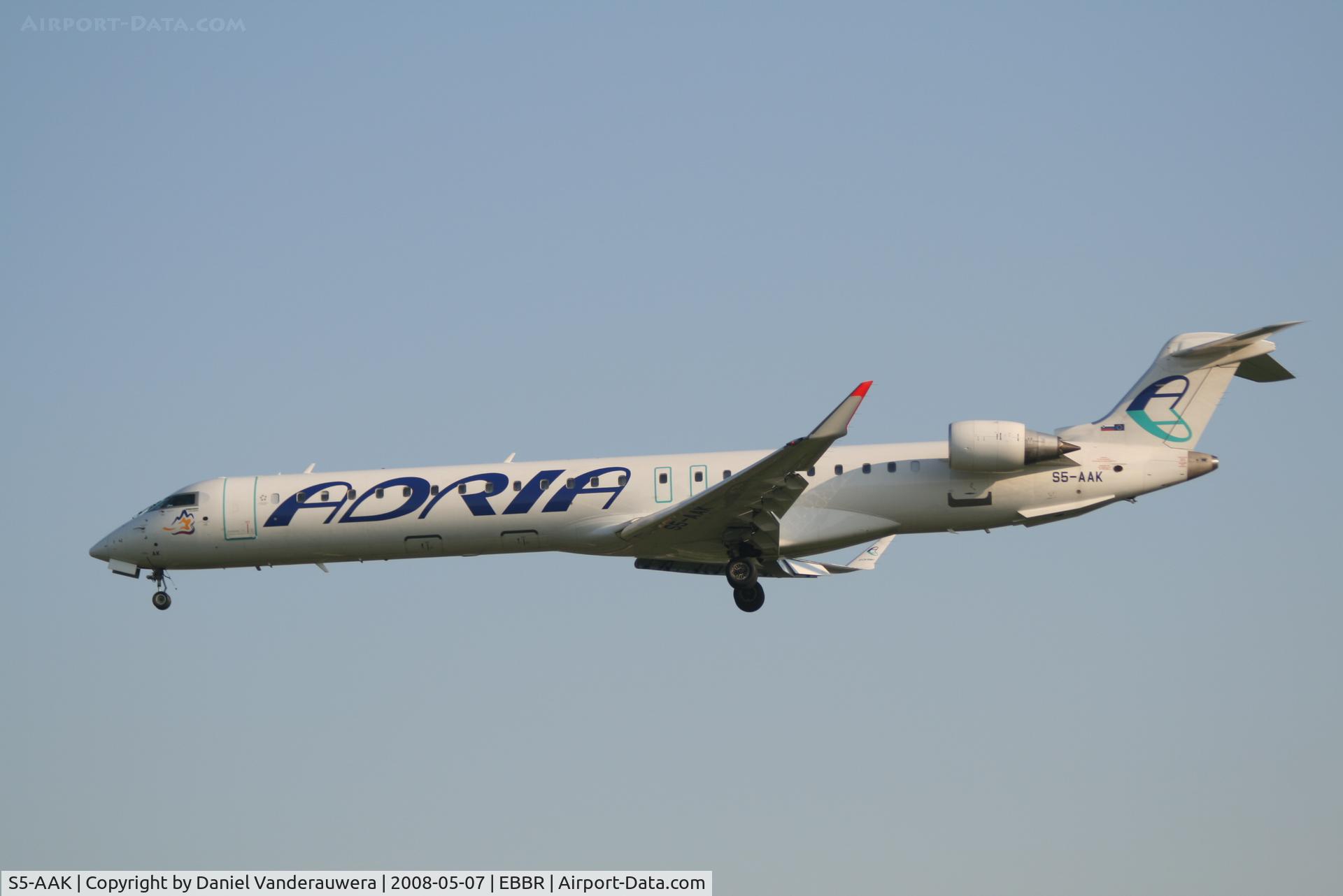 S5-AAK, 2007 Canadair CRJ-900ER (CL-600-2D24) C/N 15128, arrival of flight JP376 to rwy 25L - watch sticker left to front door