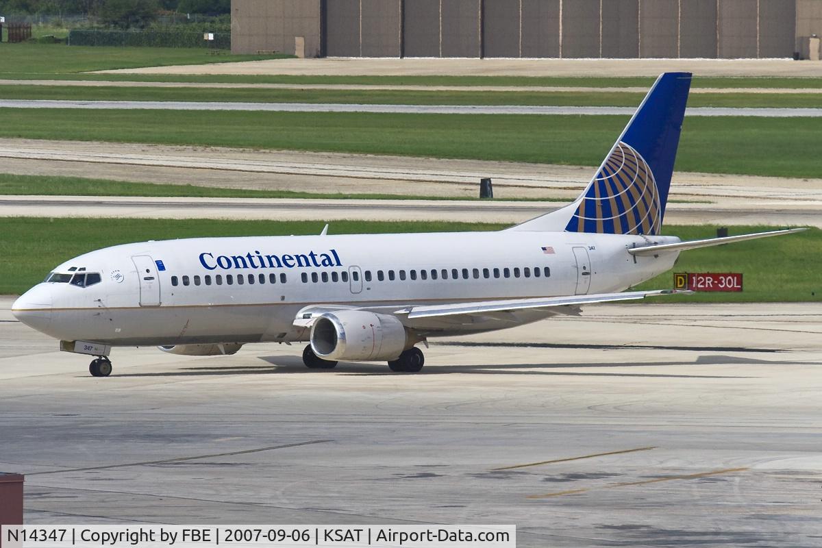 N14347, 1987 Boeing 737-3TO C/N 23585, taxying to the gate
