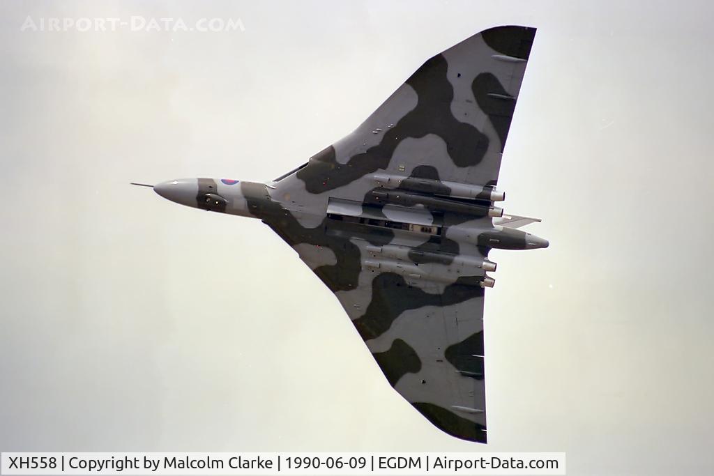 XH558, 1960 Avro Vulcan B.2 C/N Set 12, Avro Vulcan B2. Arguably the most photogenic of large military aircraft seen here performing at Boscombe's Battle of Britain Air Show in 1990.