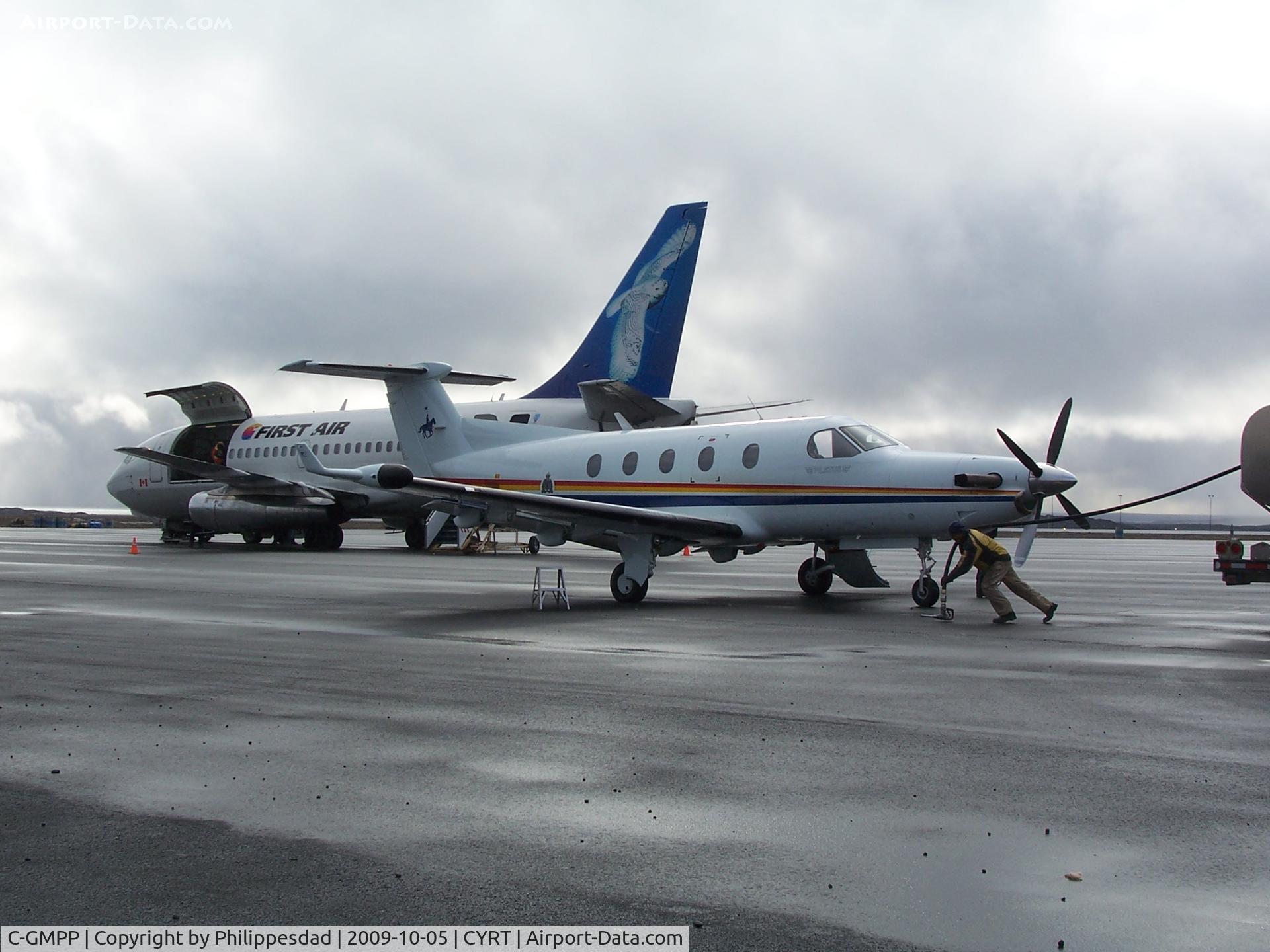 C-GMPP, 2003 Pilatus PC-12/45 C/N 374, C-GMPP (RCMP) at Rankin Inlet, NU 2009oct05 (C-FNVT behind)