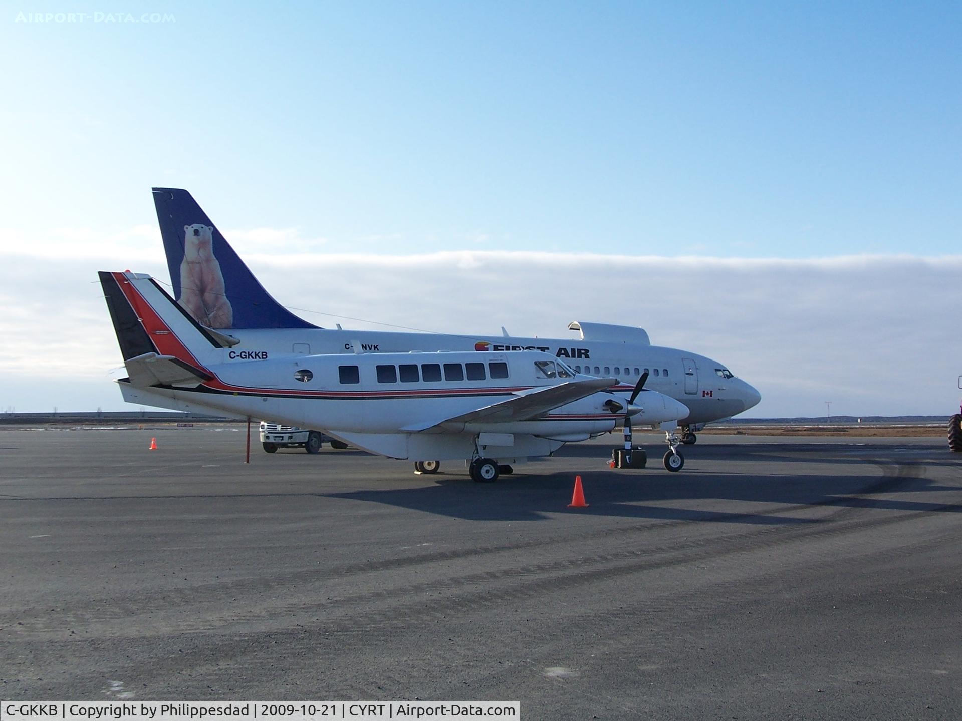 C-GKKB, 1975 Beech B99 Airliner C/N U-149, C-GKKB with C-FNVK behind, Rankin Inlet, NU 2009oct21