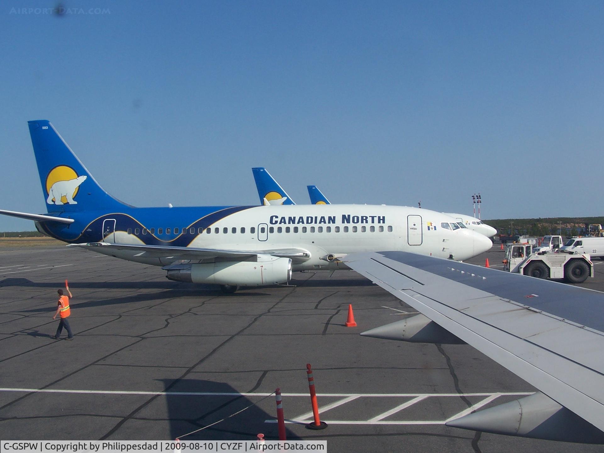 C-GSPW, 1981 Boeing 737-275C C/N 22618, C-GSPW departing Yellowknife, NT 2009aug10 with C-GKCP and C-GNDU behind