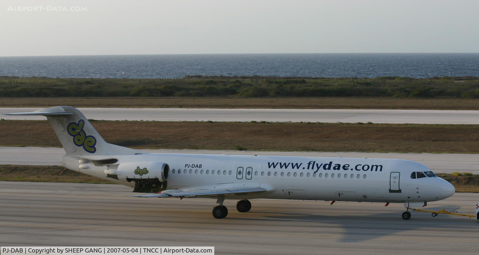 PJ-DAB, 1991 Fokker 100 (F-28-0100) C/N 11331, being pulled back to the hanger after having an engine work up at the end of the runway
