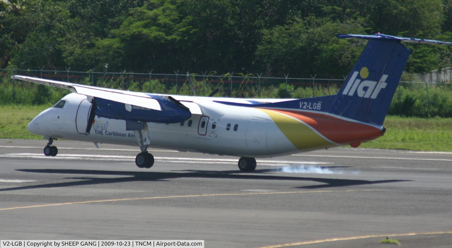 V2-LGB, 1991 De Havilland Canada DHC-8-311 Dash 8 C/N 266, againt its a bit brezzzzy or that just the style of landing