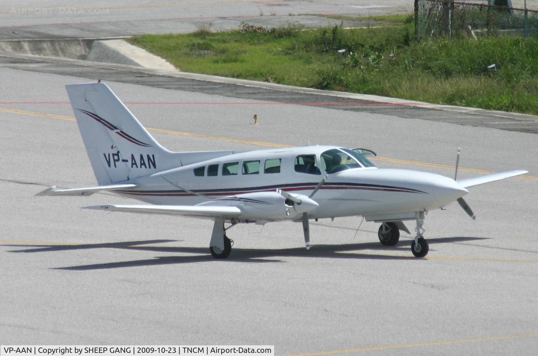 VP-AAN, 1979 Cessna 402C Businessliner C/N 402C0029, taxing to parking