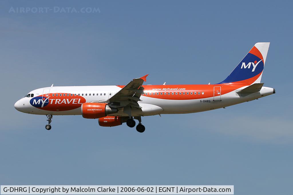 G-DHRG, 2003 Airbus A320-214 C/N 1942, Airbus A320-214. On approach to Rwy 25 at Newcastle Airport.