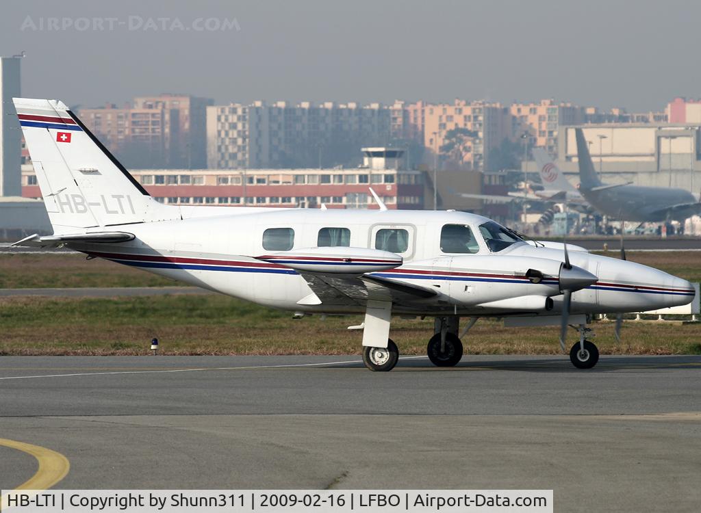 HB-LTI, 1980 Piper PA-31T Cheyenne II C/N 31T-8020091, Taxiing to the General Aviation area...