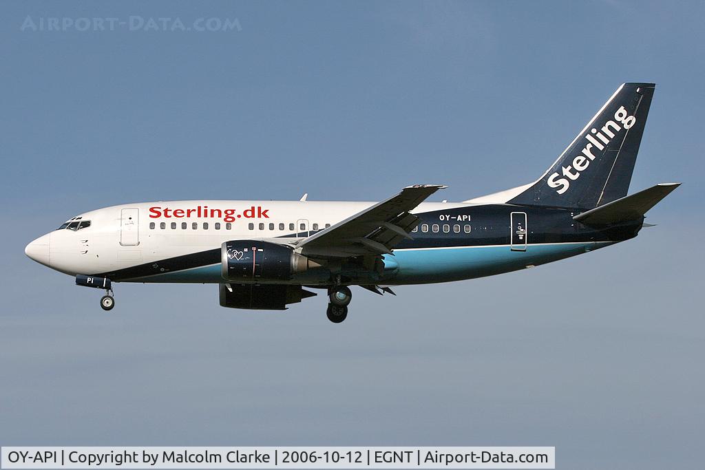 OY-API, 1997 Boeing 737-5L9 C/N 28722, Boeing 737-5L9. On approach to Rwy 25 at Newcastle Airport.