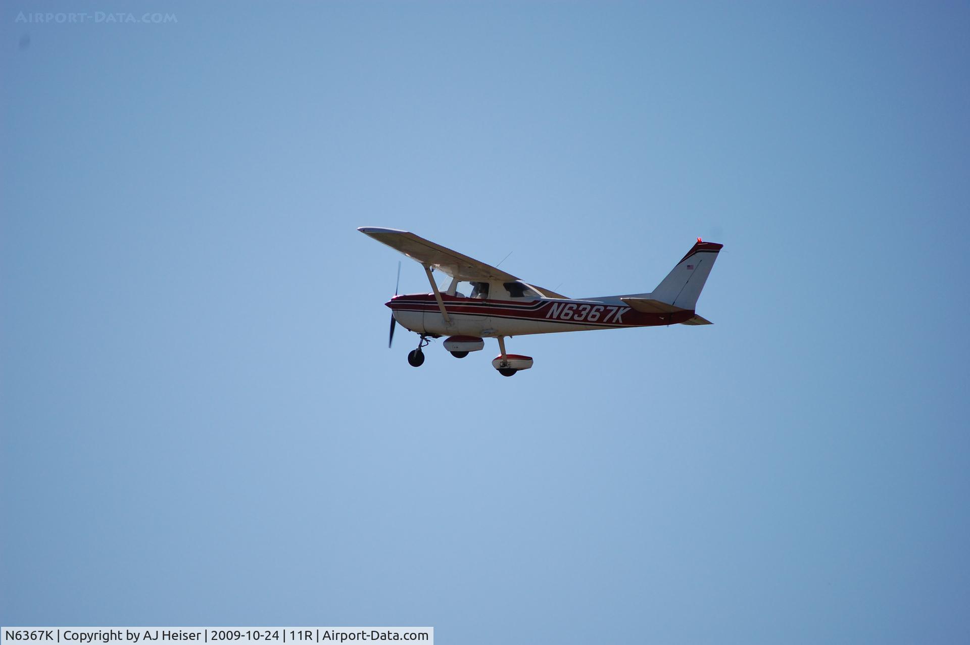 N6367K, 1975 Cessna 150M C/N 15077668, N6367K on departure from rwy 16 at 11R