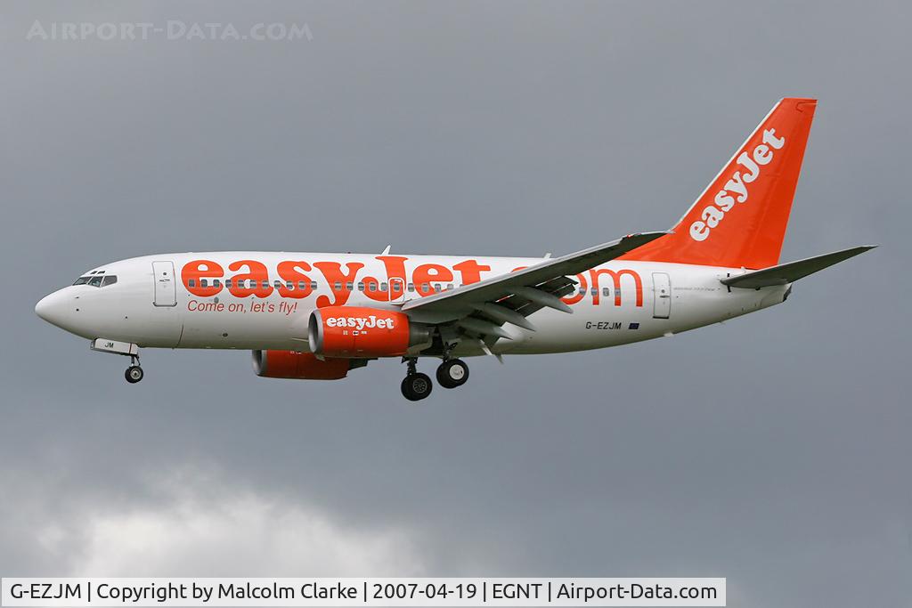 G-EZJM, 2002 Boeing 737-73V C/N 30248, Boeing 737-73V. On approach to Rwy 25 at Newcastle Airport.