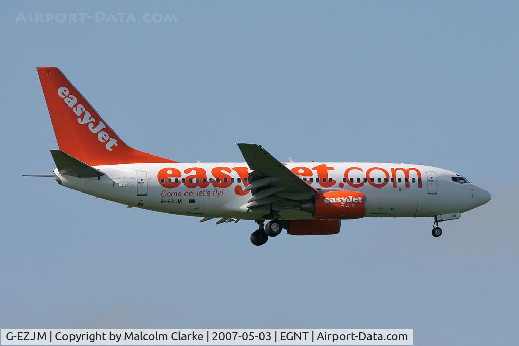 G-EZJM, 2002 Boeing 737-73V C/N 30248, Boeing 737-73V. On approach to Rwy 07 at Newcastle Airport.