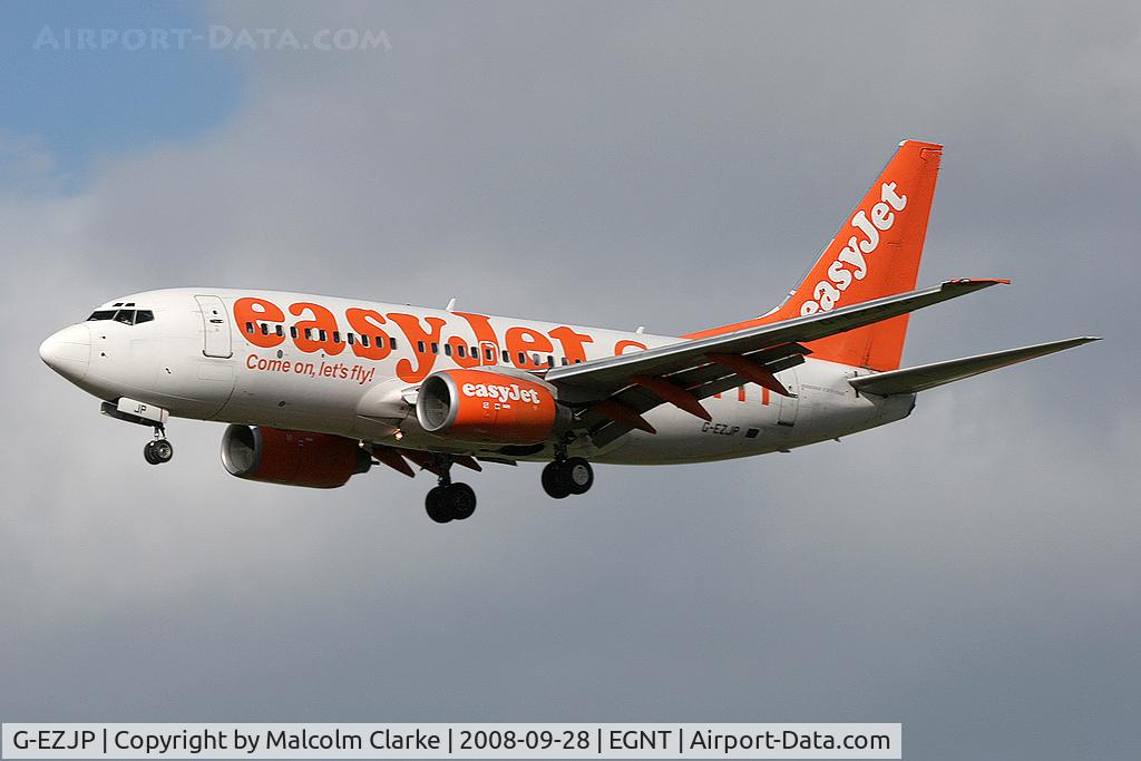 G-EZJP, 2002 Boeing 737-73V C/N 32412, Boeing 737-73V. On approach to Rwy 25 at Newcastle Airport.