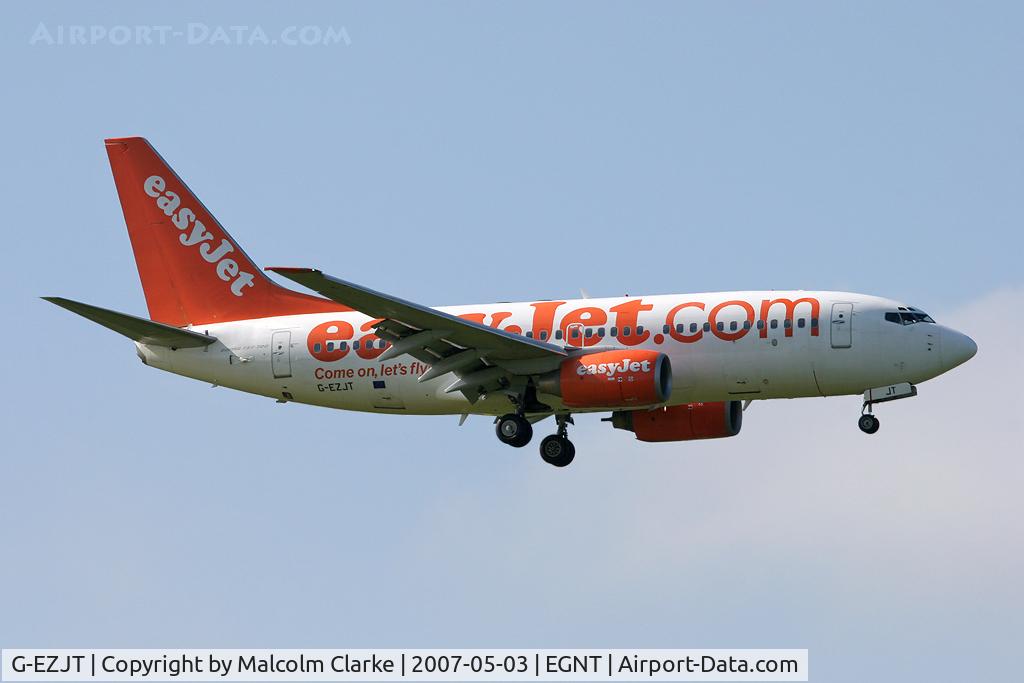 G-EZJT, 2002 Boeing 737-73V C/N 32415, Boeing 737-73V. On approach to Rwy 07 at Newcastle Airport.