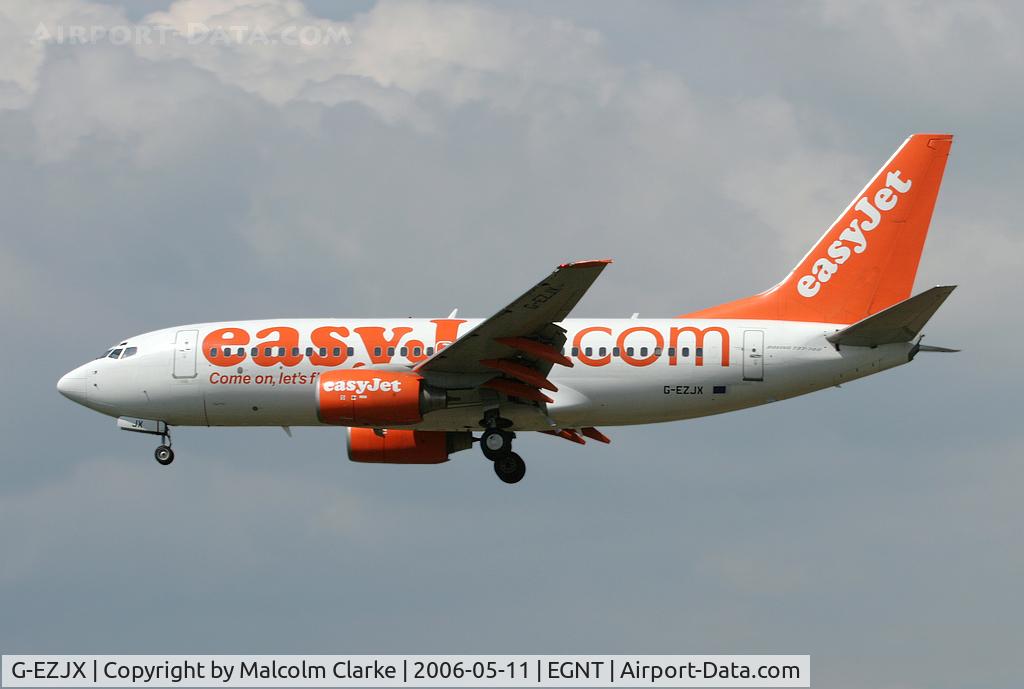 G-EZJX, 2003 Boeing 737-73V C/N 32419, Boeing 737-73V. On approach to Rwy 25 at Newcastle Airport.
