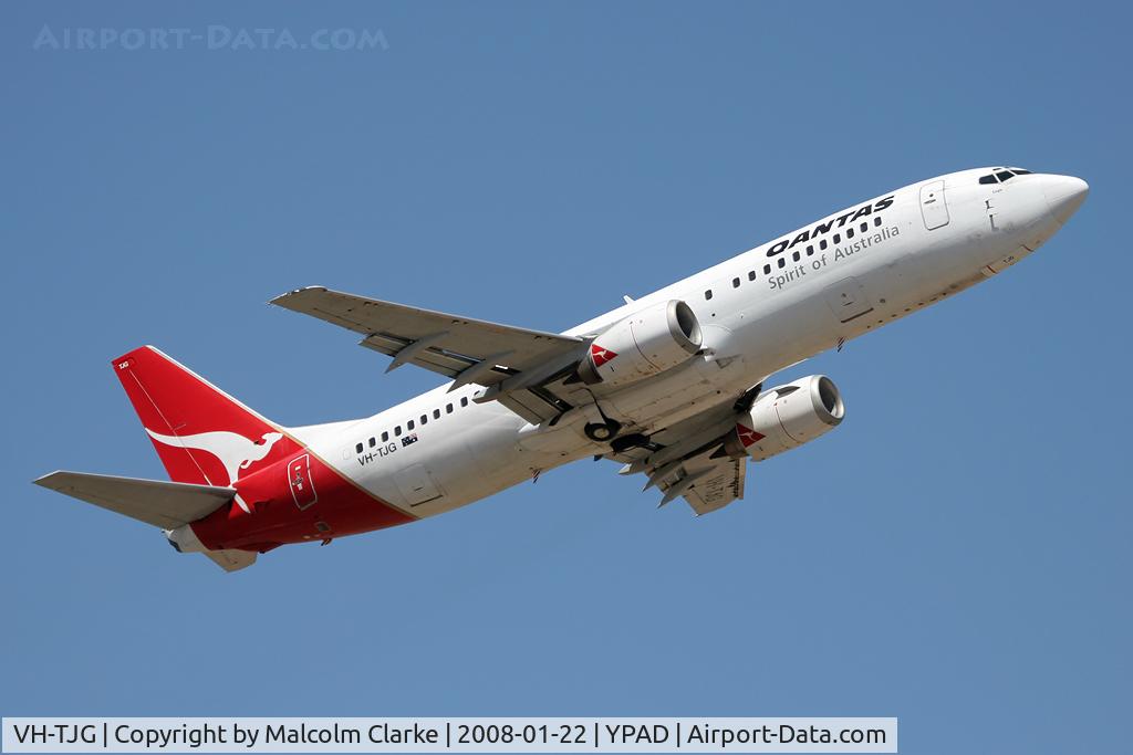 VH-TJG, 1990 Boeing 737-476 C/N 24432, Boeing 737-476 taking off from Adelaide International Airport.