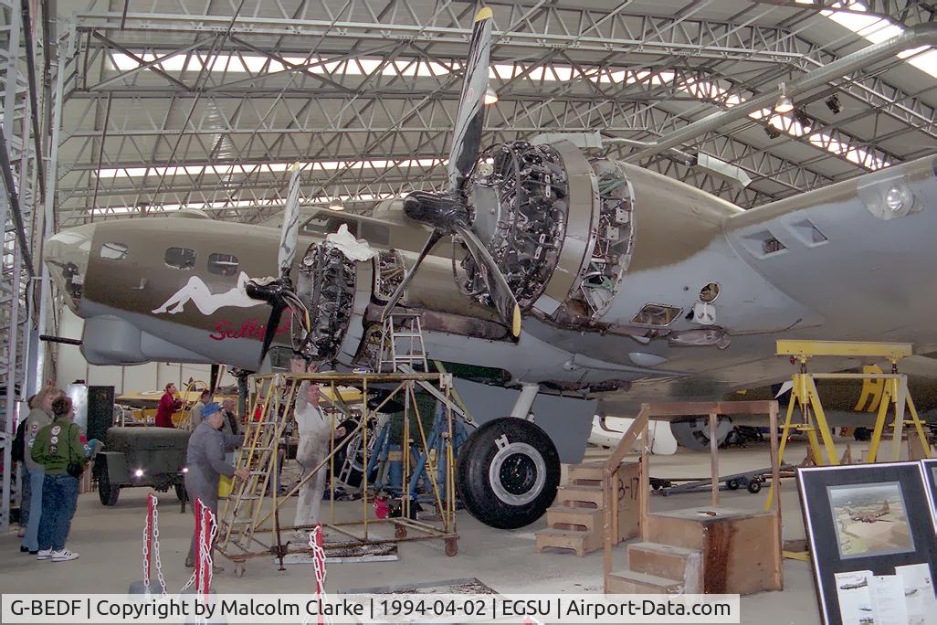 G-BEDF, 1944 Boeing B-17G Flying Fortress C/N 8693, Boeing B-17G. 124485 owned by B-17 Preservation Ltd seen here undergoing maintenance on her massive Pratt & Whitney radial engines prior to the flying season at the Imperial War Museum, Duxford.