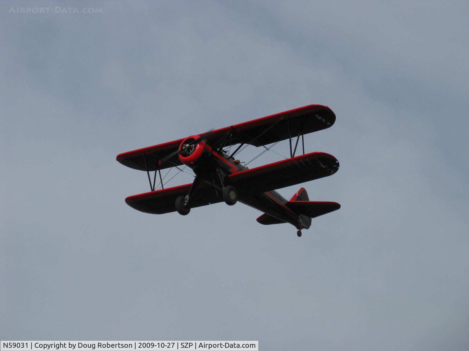 N59031, 1941 Boeing A75N1(PT17) C/N 75-3808, 1941 Boeing Stearman A75N1, Continental W670 220 Hp, takeoff climb Rwy 22