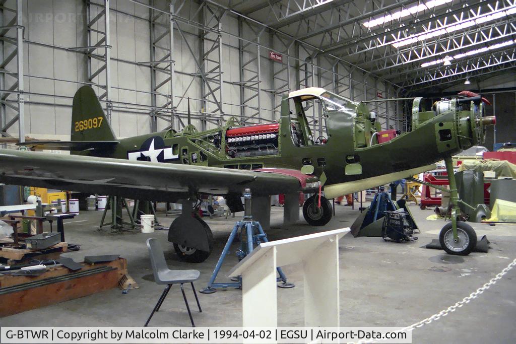G-BTWR, 1942 Bell P-63A-7BE Kingcobra C/N 33-37, BELL P-63A-7BE. A 'lids off' view showing the mid engine configuration with the indirectly driven shaft passing beneath the pilots seat. Imperial War Museum, Duxford, April 1994.