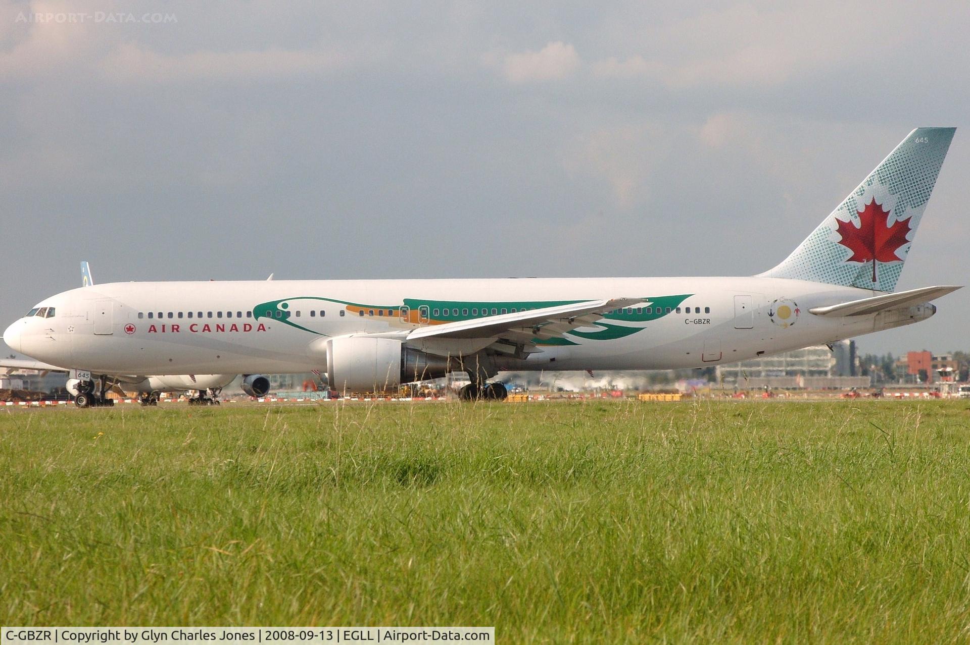 C-GBZR, 1992 Boeing 767-38E/ER C/N 25404, Lining up for take off on runway 27L whilst still bearing the 'Free Spirit' Eagle Bird scheme. Previously HL7267. Operated by Air Canada. Fleet number '645'.