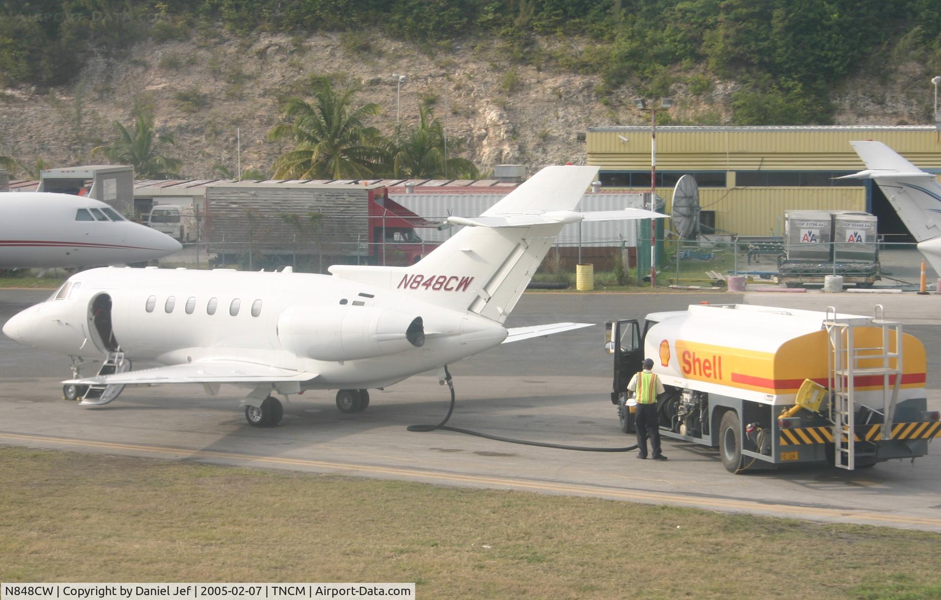 N848CW, 2003 Raytheon Hawker 800XP C/N 258648, park at the cargo ramp. being refuel