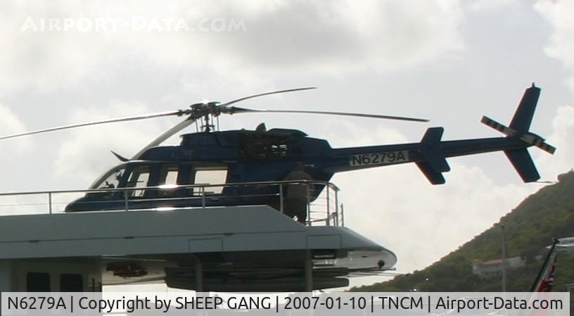 N6279A, 1997 Bell 407 C/N 53193, Being carried around by ship