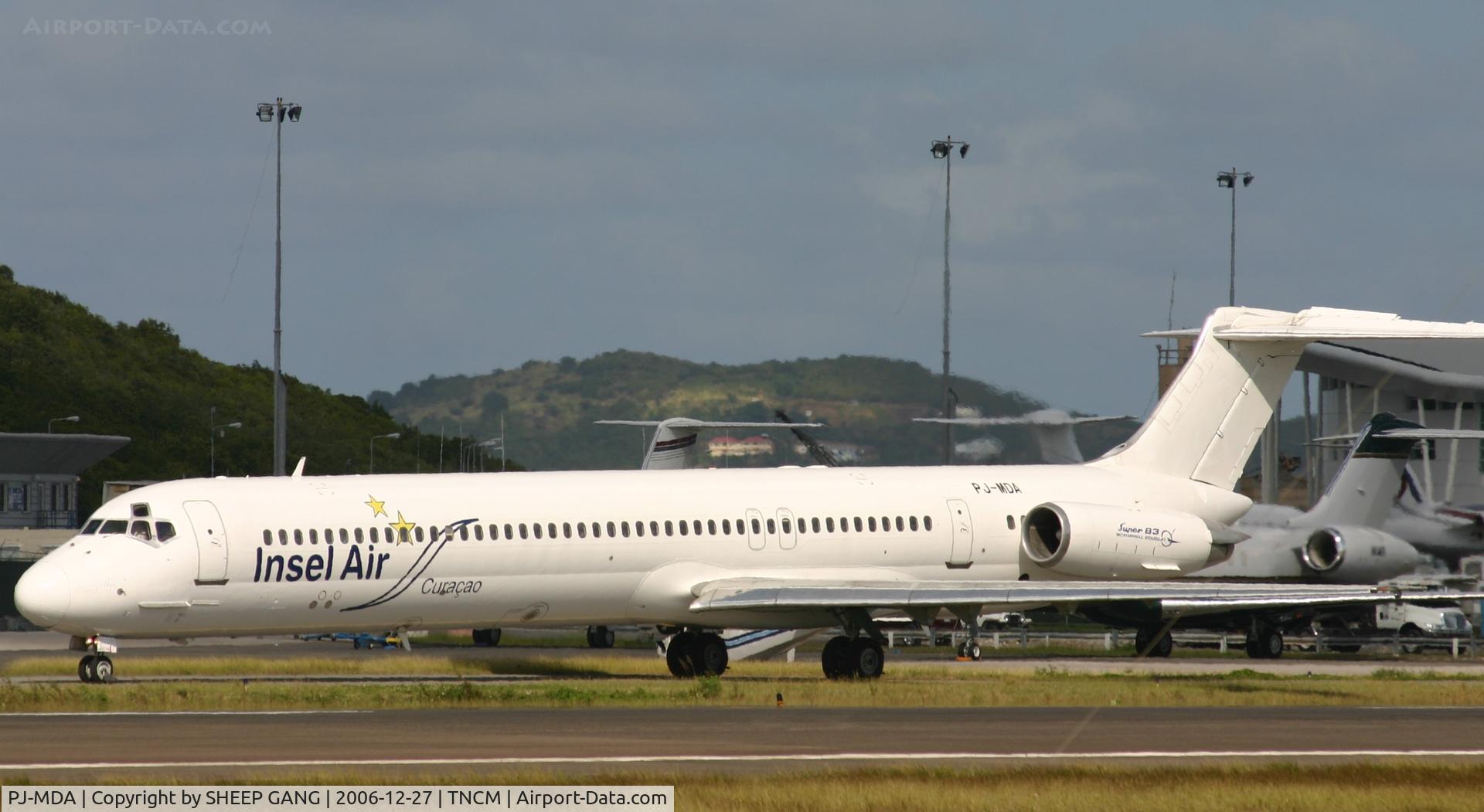 PJ-MDA, 1987 McDonnell Douglas MD-83 (DC-9-83) C/N 49449, taxing to A