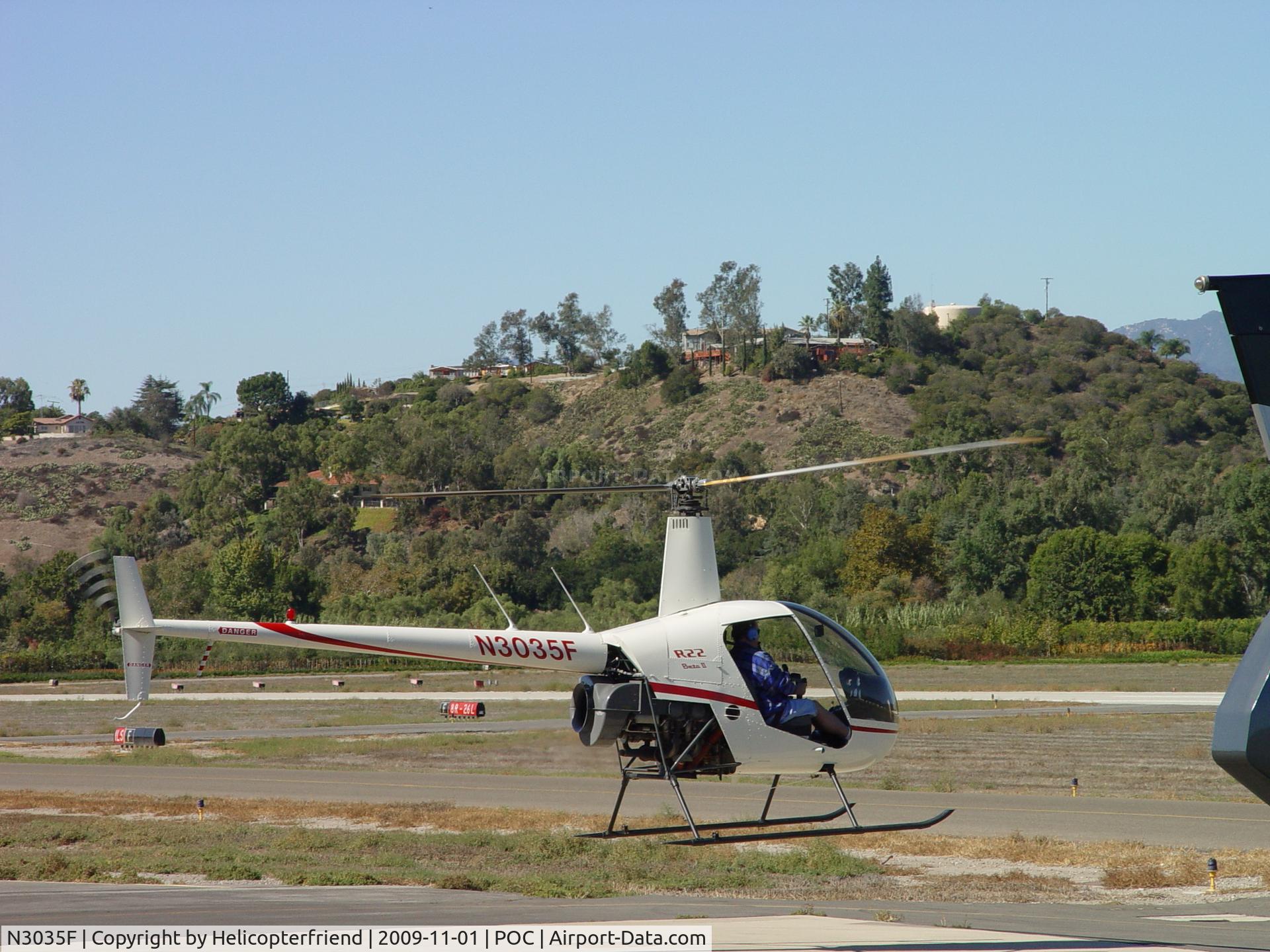 N3035F, 2007 Robinson R22 Beta C/N 4169, Hovering waiting Tower permission to go westbound for take off