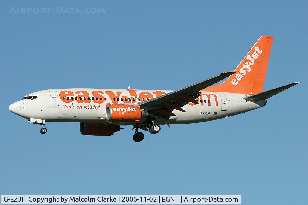 G-EZJI, 2001 Boeing 737-73V C/N 30241, Boeing 737-73V on finals to rwy 25 at Newcastle.