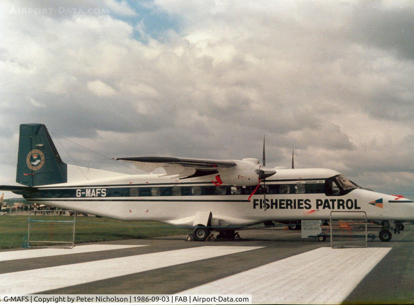 G-MAFS, 1986 Dornier 228-200 C/N 8084, This Fisheries Protection Do.228 was present at the 1986 Farnborough Airshow.