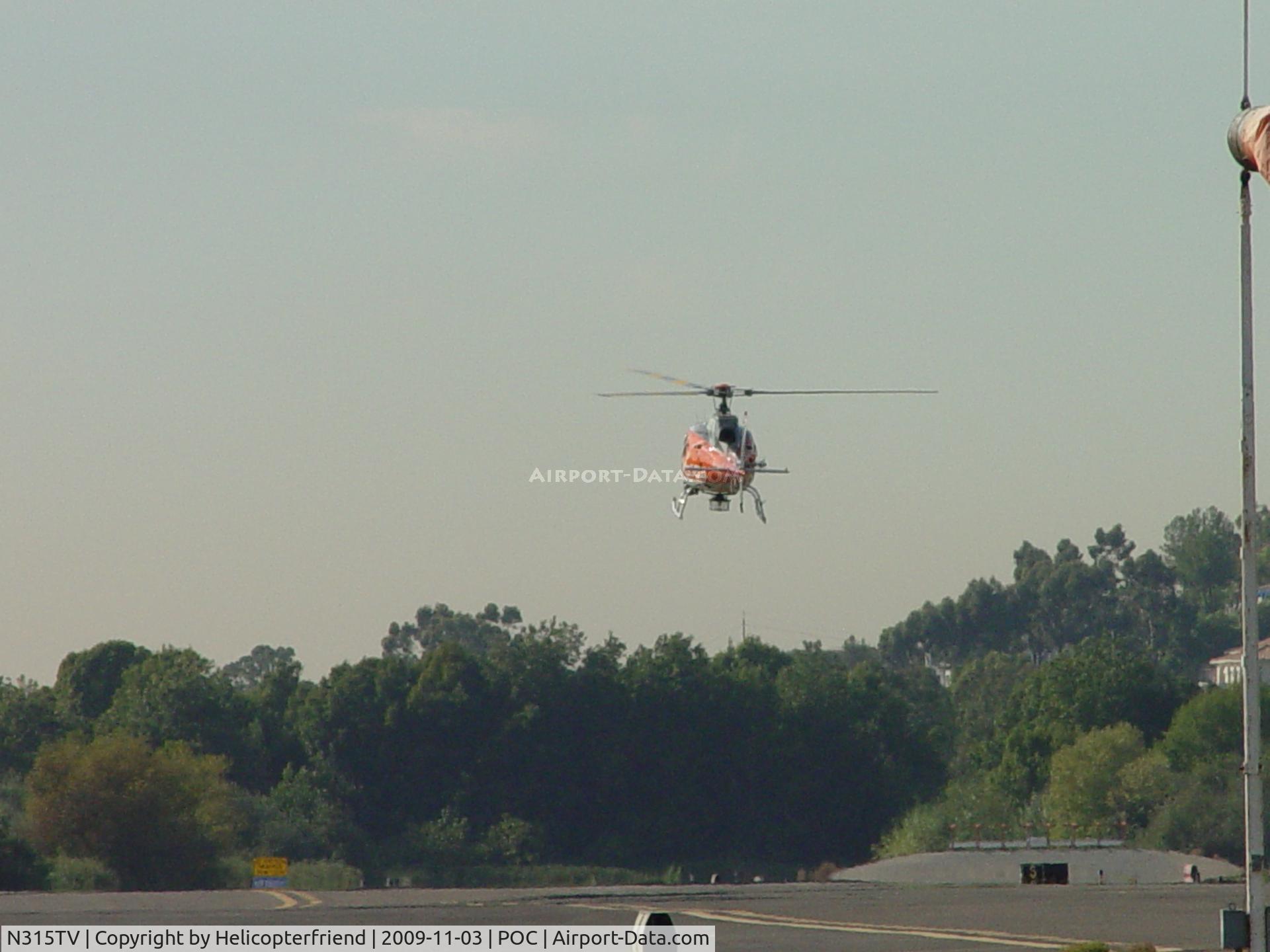 N315TV, 1994 Eurocopter AS-350BA Ecureuil C/N 2822, Flaring out to settle down on helipad