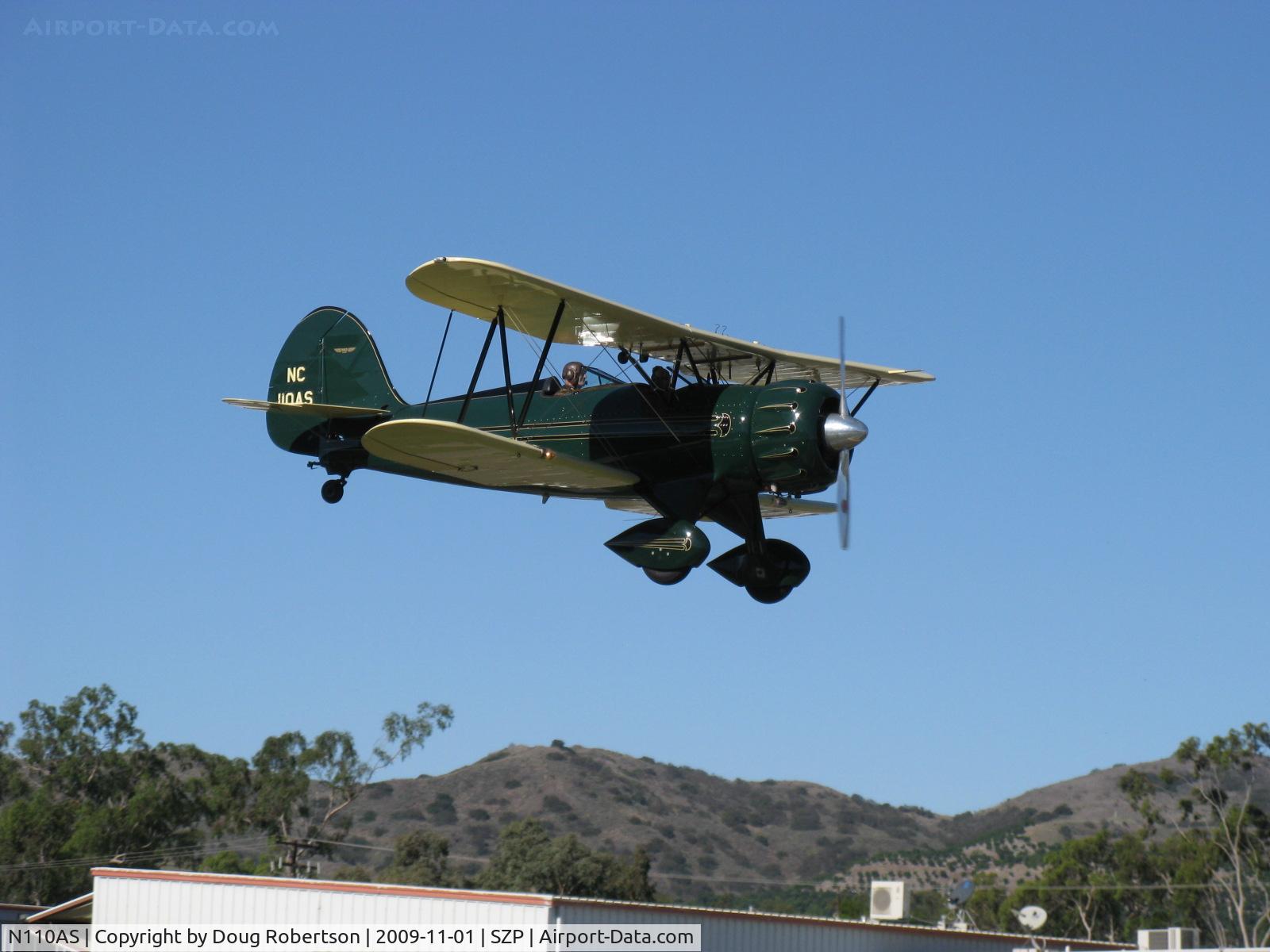N110AS, 2005 Waco YMF-F5C C/N F5C110, 2005 Waco Classic YMF-F5C, Jacobs R755B 275 Hp radial, landing Rwy 04, modern reincarnation of a classic biplane of the Waco F series of 1934-1935 built for affluent sportsmen, originally then with 225 Hp Jacobs.