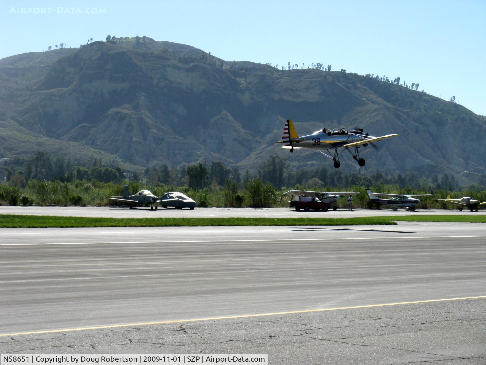 N58651, 1941 Ryan PT-22 Recruit (ST3KR) C/N 1426, 1941 Ryan Aeronautical ST-3KR as PT-22, Kinner R5-540-1 160 Hp radial, takeoff climb Rwy 22