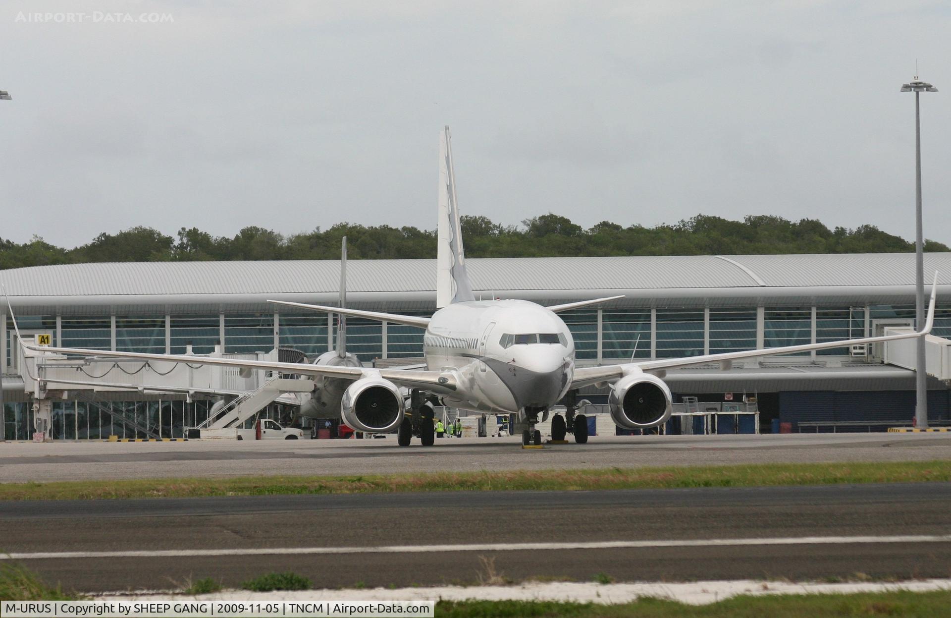 M-URUS, 2005 Boeing 737-7GC BBJ C/N 34622, Park at the ramp with the building in the back ground
