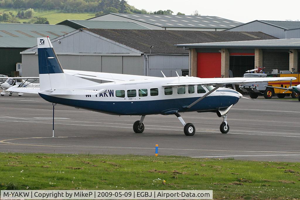 M-YAKW, 2004 Cessna 208B Grand Caravan C/N 208B-1059, Just arrived and parked on the terminal ramp.