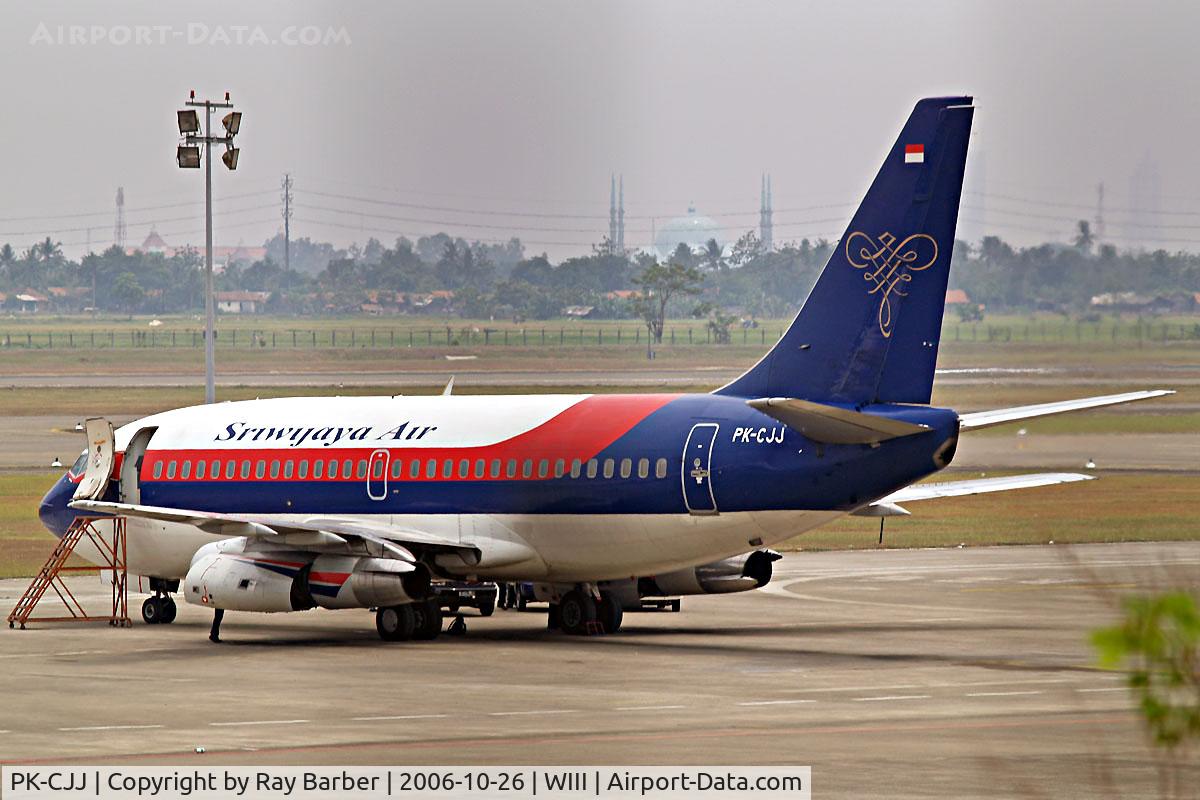 PK-CJJ, 1982 Boeing 737-2B7 C/N 22880, Boeing 737-2B7 [22880] (Sriwijaya Air) Jakarta - Soekarno Hatta International~PK 26/10/2006. Taken through the fencing which accounts for some darker areas seen in the sky.