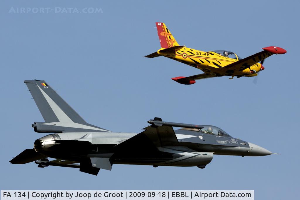 FA-134, SABCA F-16AM Fighting Falcon C/N 6H-134, Nice formation of the new display F-16 and tiger marked SF-260 ST-48. FA-134 had some problems to keep pace with the slow mover.