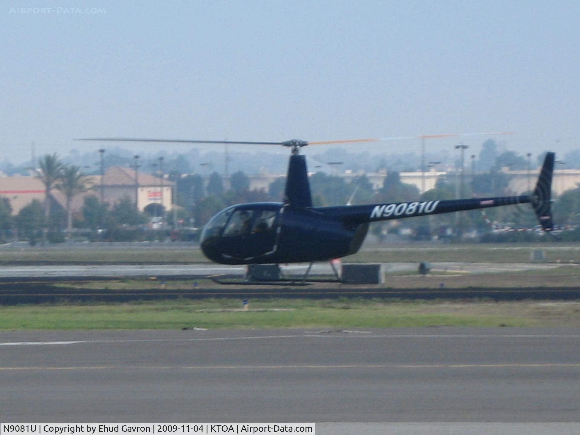 N9081U, 1999 Robinson R22 Beta II C/N 3010, New Robinson R44 out for checkride at the plant