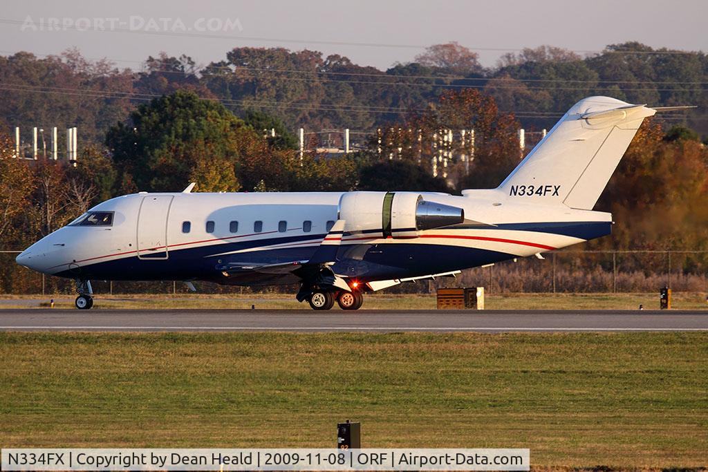 N334FX, 2004 Bombardier Challenger 604 (CL-600-2B16) C/N 5586, Business Jet Solutions 2004 Bombardier CL-600-2B16 Challenger 604 N334FX rolling out on RWY 5 after arrival from Palm Beach Int'l (KPBI).