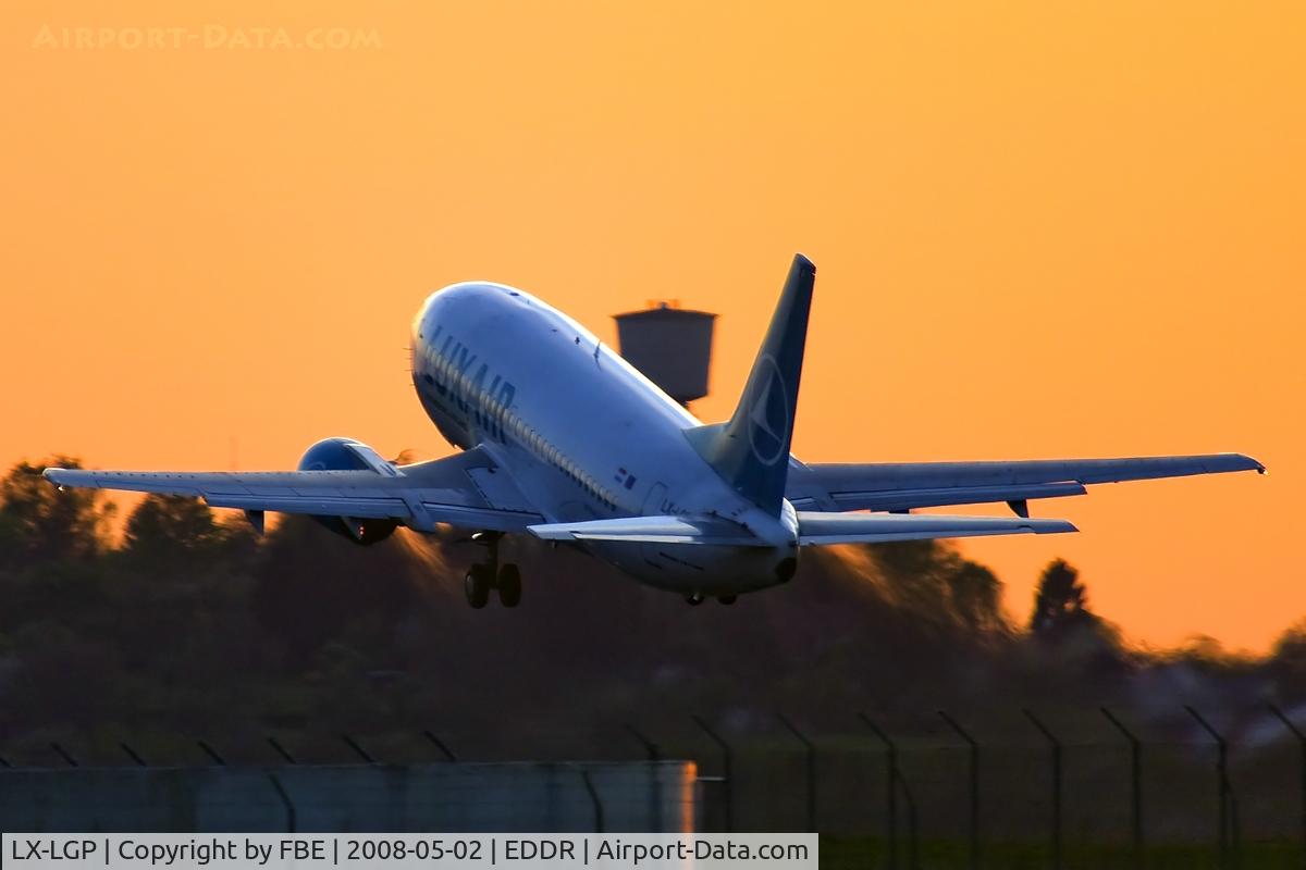 LX-LGP, 1993 Boeing 737-5C9 C/N 26439, departing into the sunset