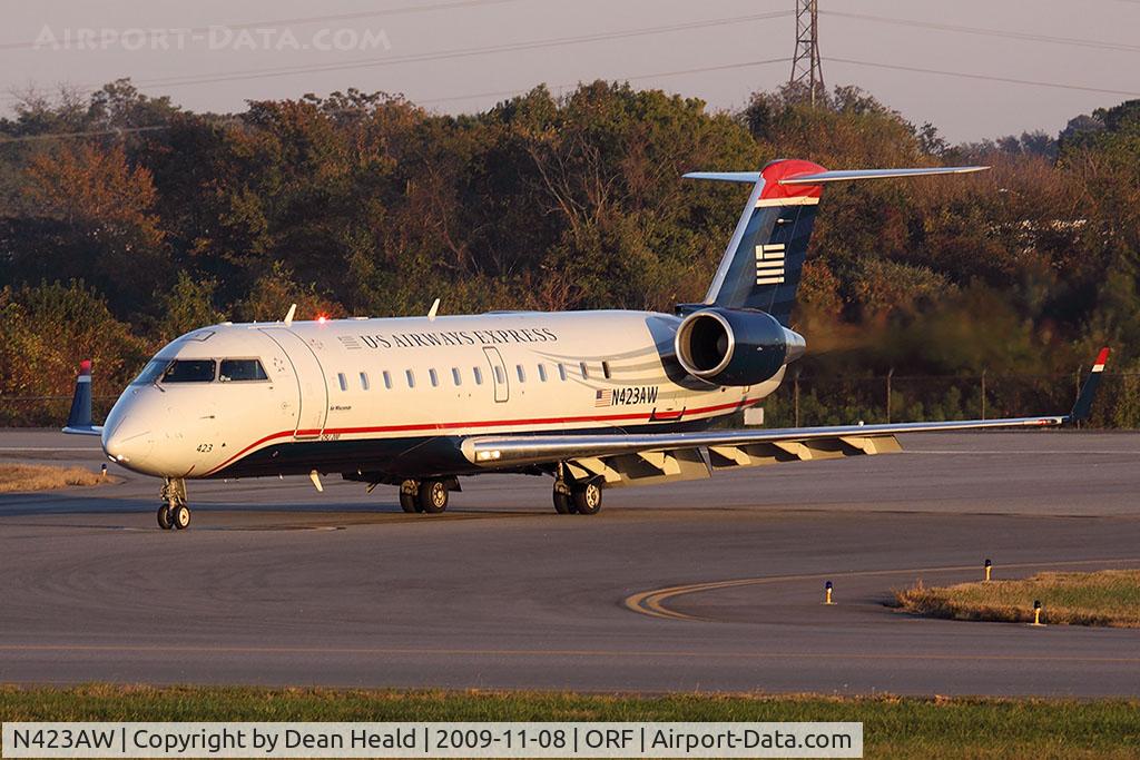 N423AW, 2002 Bombardier CRJ-200LR (CL-600-2B19) C/N 7636, US Airways Express (Air Wisconsin) N423AW (FLT AWI3719) exitting RWY 5 after arrival from Philadelphia Int'l (KPHL) late in the day.