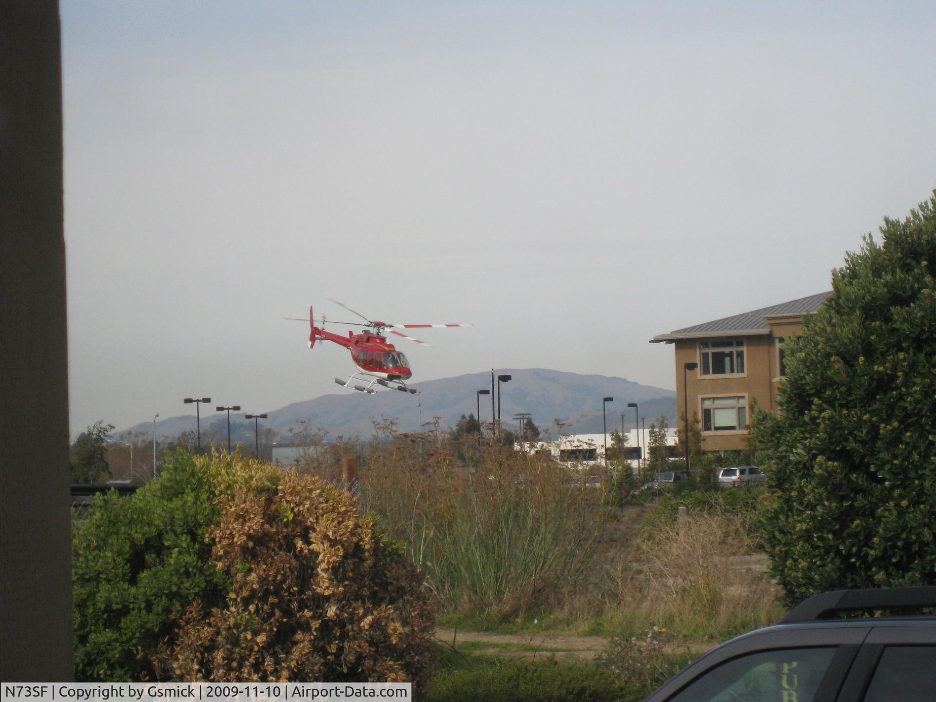 N73SF, 2008 Bell 407 C/N 53839, N73SF taking off from San Rafael Heliport (private; JSG)