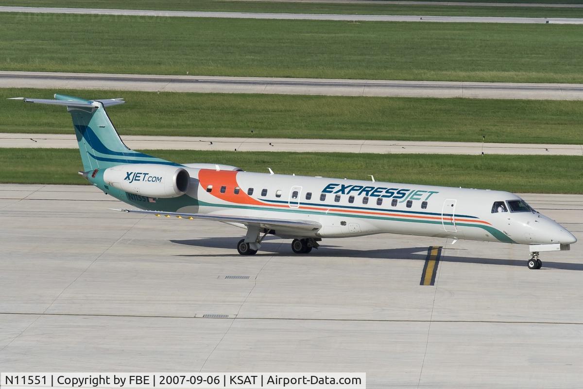 N11551, 2002 Embraer ERJ-145LR (EMB-145LR) C/N 145411, taxying to the stand