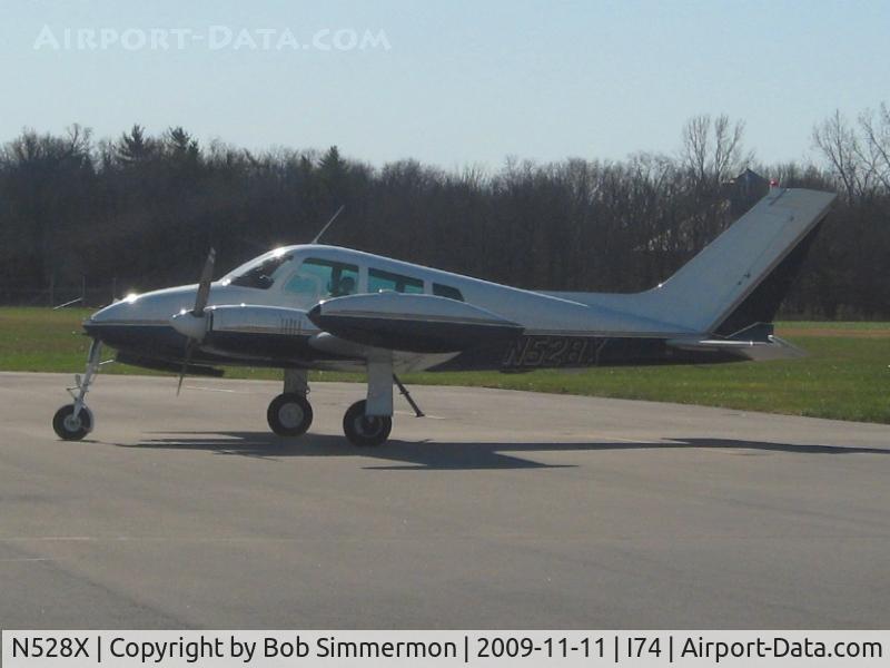 N528X, 1961 Cessna 310F C/N 310-0128, On the ramp at Urbana, Ohio
