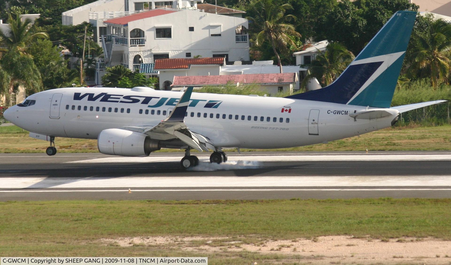C-GWCM, 2003 Boeing 737-7CT C/N 32756, West jet landing at TNCM
